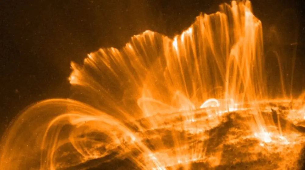 Large coronal loops sitting above the solar surface, all imaged in extreme ultraviolet emission (Image credit: NASA/TRACE)
